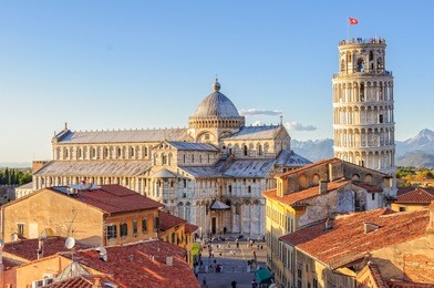 cathedral (duomo) and the leaning tower photographed from above the roofs, from the grand hotel duomo - pisa, tuscany, italy