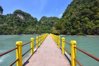 jetty heading to 'pulau dayang bunting' in langkawi island, malaysia. one of the most attraction places for tourists in langkawi island. 