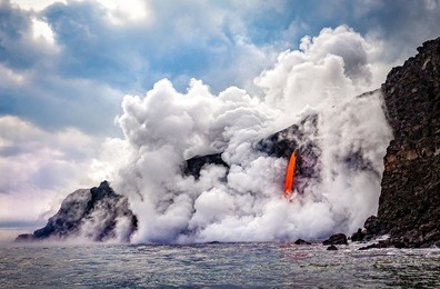 wide shot of the kamokuna ocean entry in hawaii's volcano national park