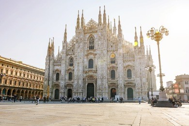 cathedral duomo di milano in square piazza duomo at sunny morning, milan, italy.
