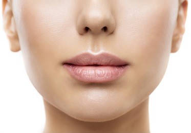lips, woman face mouth beauty, beautiful skin and full lip closeup, pink lipstick