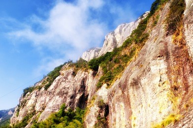 early morning clouds hanging over yandangshan or yandang mountains in china in zhejiang province.