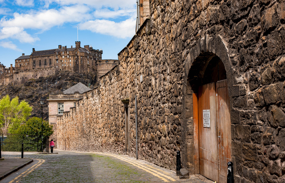 streets of edinburgh in a sunny day: heriot place with a view of edinburgh castle