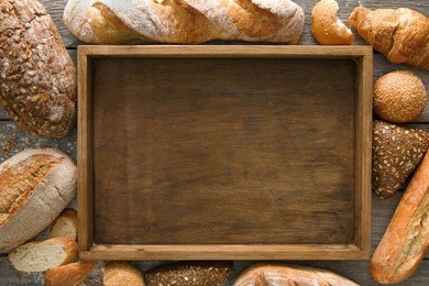 bread bakery background, copy space on wooden tray top view