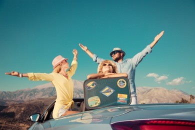 happy family travel by car. people having fun in the mountains. father, mother and child on summer vacation. 