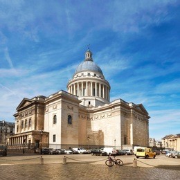 pantheon in paris on a bright day with blue sky and feather clouds, panoramic image.