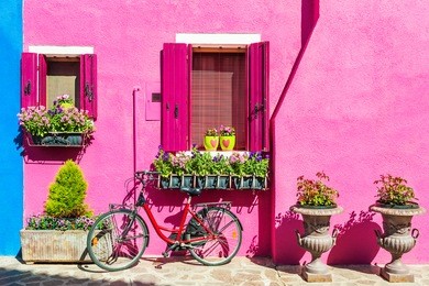 house with pink wall. colorful houses in burano island near venice, italy