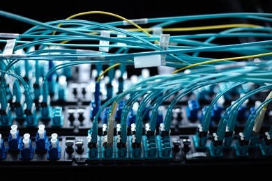 internet cables being connected to the switch panel