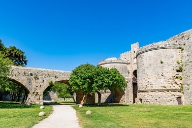 gate d’amboise in rhodes, grand gate below the palace of the grand master, and bridge leading to it, rhodes island, greece 