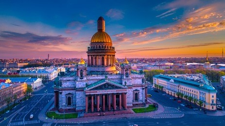 saint isaac's cathedral. st. petersburg. view from issakievskaya square. the city is in the sunshine. sunrise.