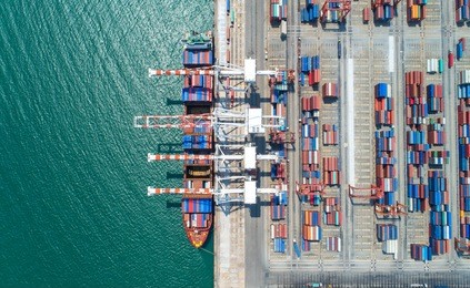 container,container ship in import export and business logistic,by crane ,trade port , shipping,cargo to harbor.aerial view,water transport,international,shell marine,transportation,logistic