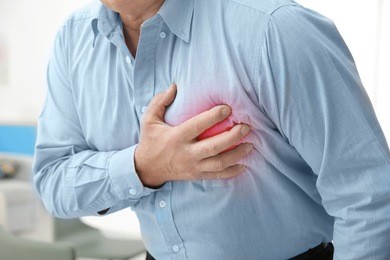 heart attack concept. senior man suffering from chest pain, closeup