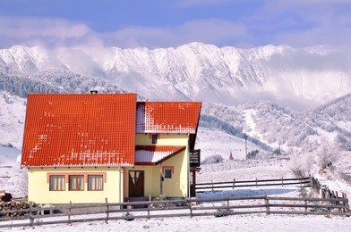 nice chalet in wintry landscape