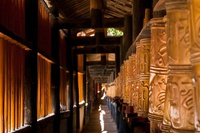 old golden tibetan prayer wheels