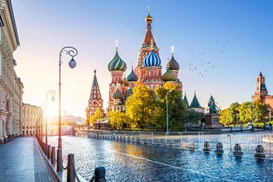 st. basil's cathedral on red square in moscow and the morning autumn sun