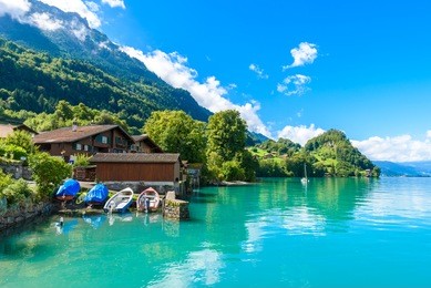 village iseltwald at lake brienz - beautiful lake in the alps at interlaken, switzerland