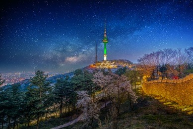 seoul tower with milky way in seoul, south korea.