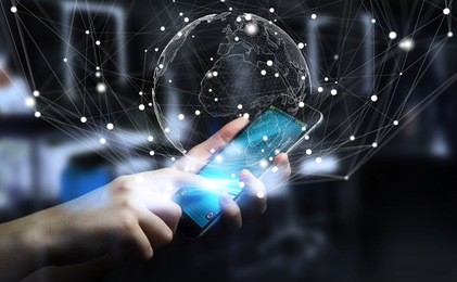 businessman on blurred background using flying earth network interface 3d rendering