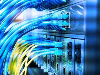 fiber optic cables connected to an optic ports