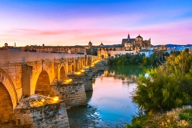 mezquita cathedral or the great mosque, illuminated at dusk in cordoba, andalusia, spain