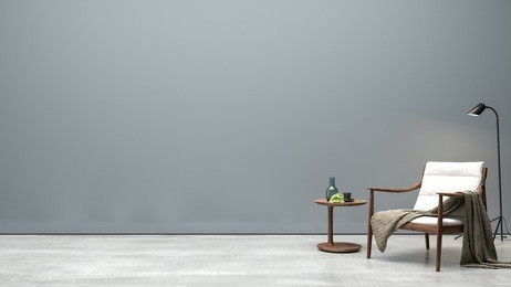 interior modern living - grey wall with wooden chair , side table and lamp on concrete floor/ 3d rendering