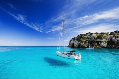 beautiful bay with sailing boats, menorca island, spain