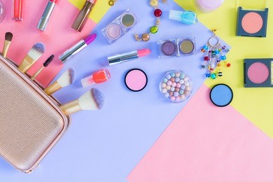 colorful make up products material design flat lay scene with copy space