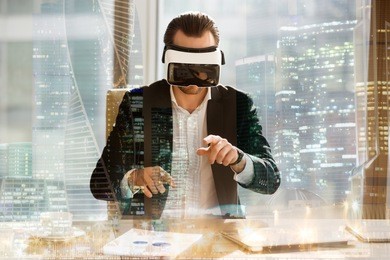 businessman in virtual reality glasses working in cyberspace at desk office. entrepreneur in vr headset immersed in city digital simulation. augmented reality at workplace double exposure mockup