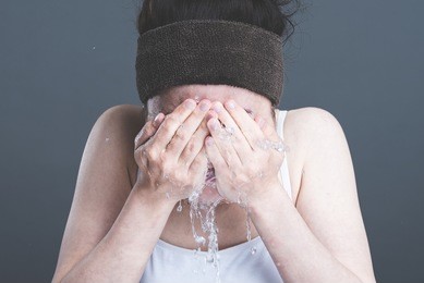 women, washing face