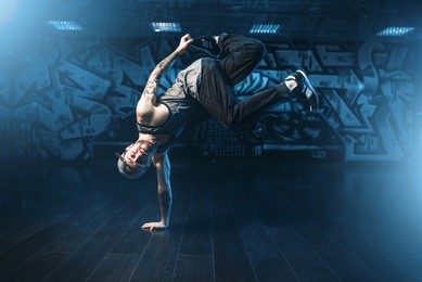 male rapper in dance studio, trendy lifestyle