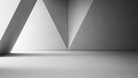 abstract interior design of modern showroom with empty white concrete floor and gray wall background - 3d rendering