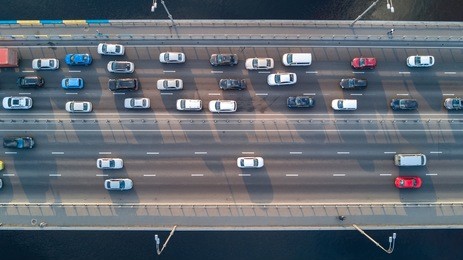 aerial top view of bridge road automobile traffic of many cars, transportation concept
