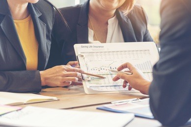 insurance agent suggestion for life insurance saving plan. protect life and accident insurance concept