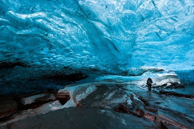 inside an icecave in vatnajokull, iceland, the ice is thousands of years old and so packed it is harder than steel and crystal clear.