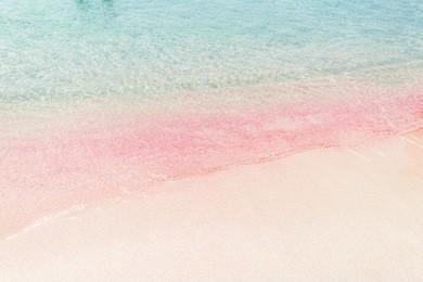 elafonissi beach with its pink and red sand and transparent water, crete island, greece