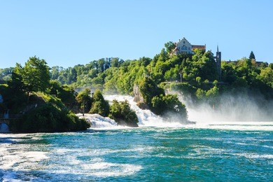 view of rhine falls (rheinfalls), the largest plain waterfall in europe. it is located  in northern switzerland.