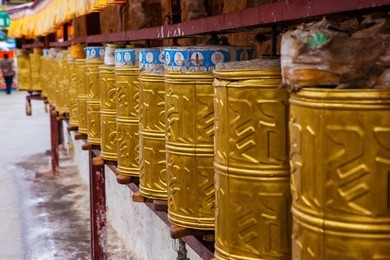 lhasa scenery.  prayer wheels at the foot of the potala palace mountain. taken on the lhasa, tibet, china. 