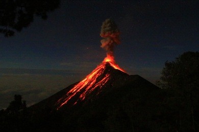 volcano el fuego erupting at night, close to antigua, guatemala. photo taken from vulcan acatenango.