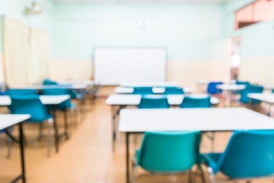 blur image of empty classroom.