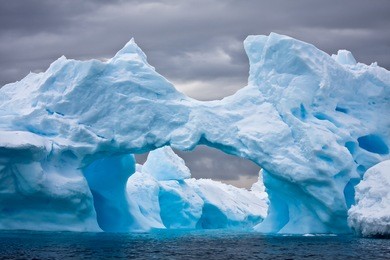 huge iceberg in antarctica, dark sky