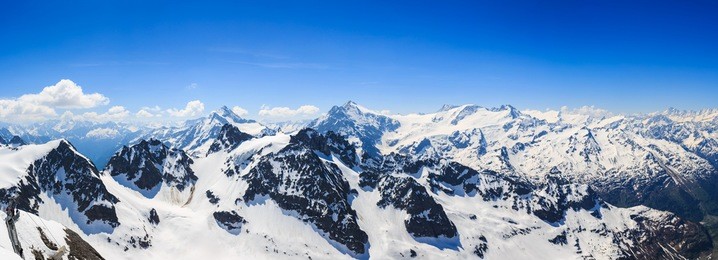 panorama of the snow mountain range mountain range from the titlis is a mountain of the uri alps engelberg, switzerland.