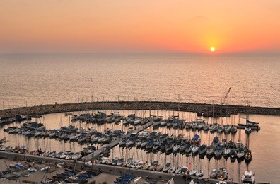 tel-aviv sunset over yacht harbor, israel