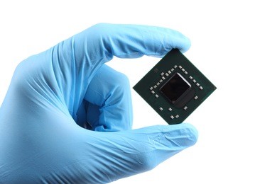 laptop video chip in hand isolated on white background