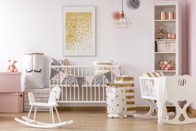 bright crib nook with golden dots poster and golden accents