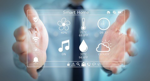 businessman on blurred background using smart home digital interface 3d rendering