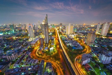 bangkok capital city in night light at downtown, with apartments and condominium living place