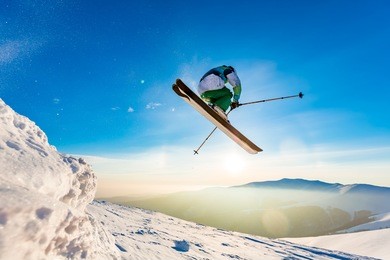 good skiing in the snowy mountains, carpathians, ukraine, a beautiful winter sunset, incredible ski jump