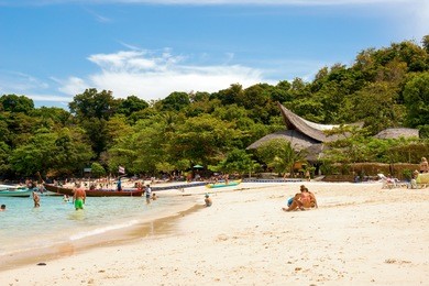 banana beach on coral (ko he) island on a sunny day, phuket, thailand 