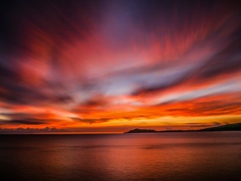 a long exposure of an amazing sunset from china walls on oahu