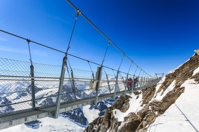 suspension bridge on titlis mountain, switzerland.